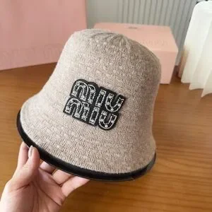 Miu Miu Tan Bucket Hat with Logo Miu Miu Khaki Embroidered Bucket Hat - ShopStyle main image 2